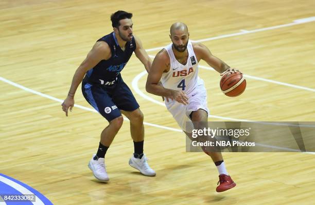 Kendall Marshall of United States fights for the ball with Facundo Campazzo of Argentina during the FIBA Americup final match between US and...