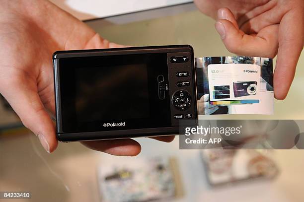 The new Polaroid PoGo Instant digital camera with an intergrated printer is on display at the Polaroid booth at the 2009 Consumer Electronics Show in...