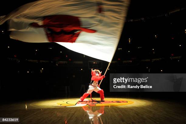 Chicago Bulls mascot Benny the Bull waves the team flag prior to player introductions for the NBA game against the Washington Wizards on January 9,...