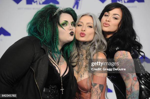 Kelly Doty, Ryan Ashley Malarkey and Nikki Simpson of 'Ink Master: Angels' arrive at the 2017 MTV Video Music Awards at The Forum on August 27, 2017...