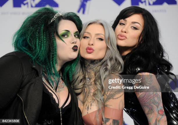 Kelly Doty, Ryan Ashley Malarkey and Nikki Simpson of 'Ink Master: Angels' arrive at the 2017 MTV Video Music Awards at The Forum on August 27, 2017...