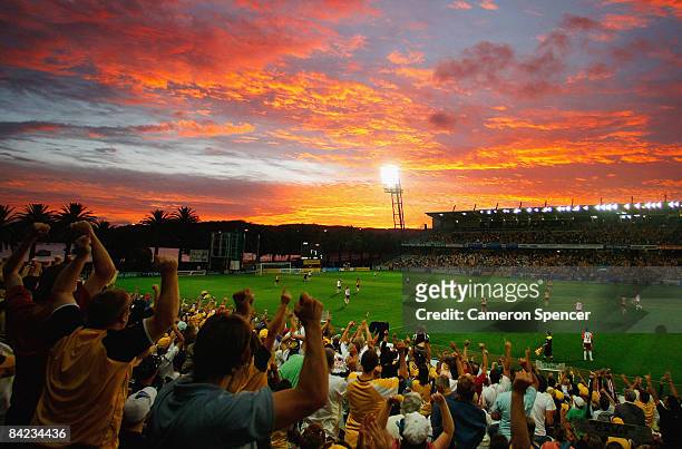 Mariners fans celebrate a goal during the round 19 A-League match between the Central Coast Mariners and the Queensland Roar at Bluetongue Stadium on...