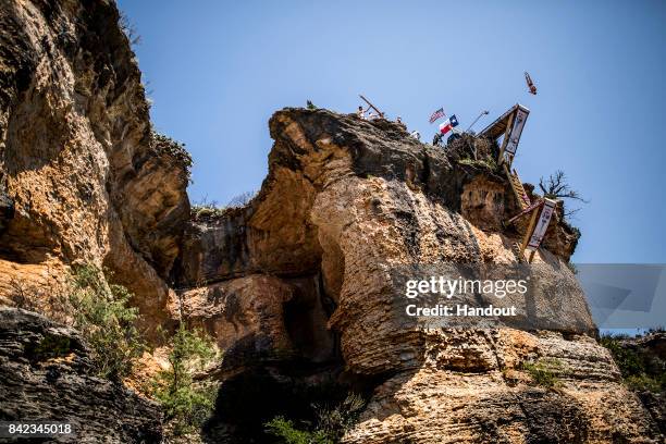 In this handout image provided by Red Bull, Andy Jones of the USA dives from the 27 metre platform during the fourth stop of the Red Bull Cliff...