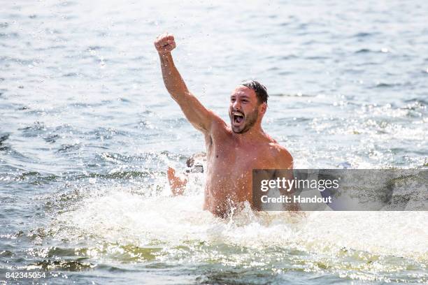 In this handout image provided by Red Bull, Blake Aldridge of the UK reacts after his final dive from the 27 metre platform during the fourth stop of...