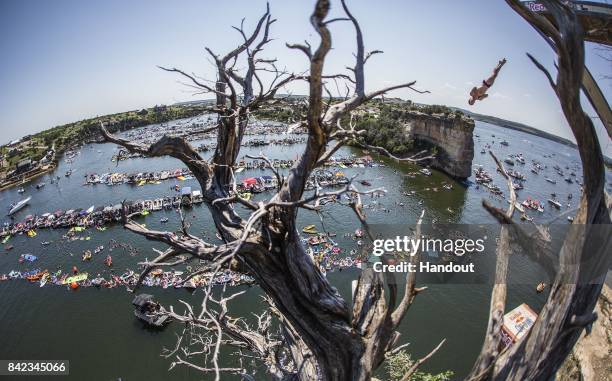 In this handout image provided by Red Bull, Andy Jones of the USA dives from the 27 metre platform during the fourth stop of the Red Bull Cliff...