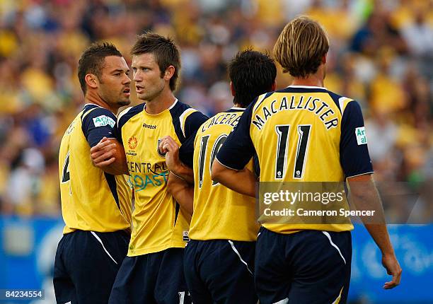 Matthew Osman of the Mariners and team-mates form a wall to block a penalty kick during the round 19 A-League match between the Central Coast...