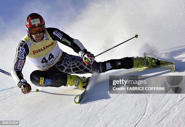 Jake Zamansky of the US clears a gate on his way to place 27th in the Men's giant slalom at the FIS Alpine Skiing World Cup on January 10, 2009 in...