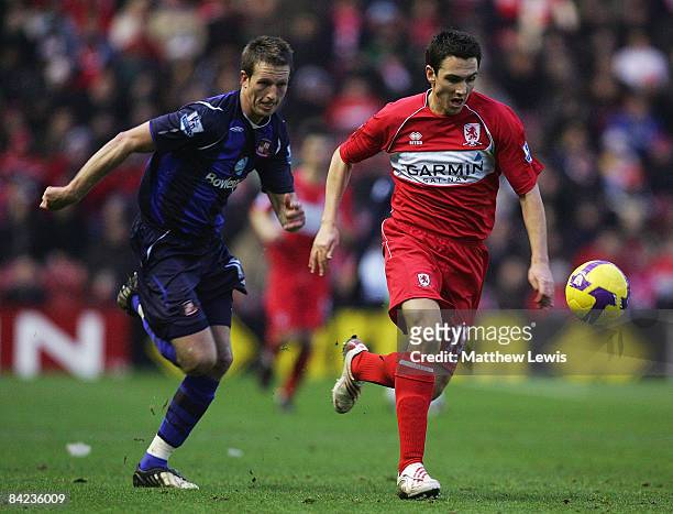Stewart Downing of Middlesbrough beats Danny Collins of Sunderland during the Barclays Premier League match between Middlesbrough and Sunderland at...