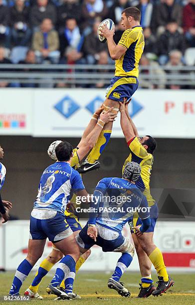 Clermont's Loic Jacquet vies with Montpellier's Johan Wasserman and Louis Picamoles during the French Top 14 Rugby Union match Montpellier vs. Stade...