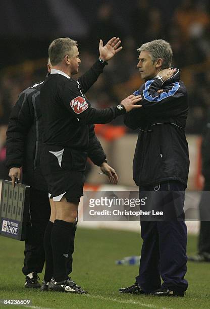 Manager Alan Irvine of Preston is sent to the stands by referee Colin Webster during the Coca-Cola Championship match between Wolverhampton Wanderers...