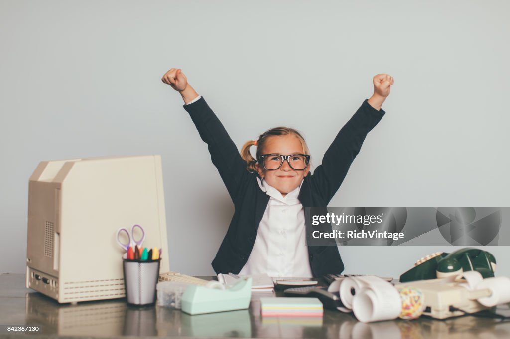 Young Business Girl Working at Office Desk