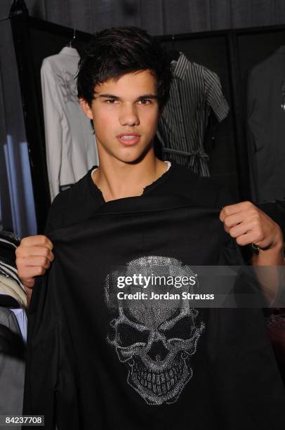 Actor Taylor Lautner attends the Access Hollywood "Stuff You Must..." Lounge produced by On 3 Productions celebrating the Golden Globes held at...