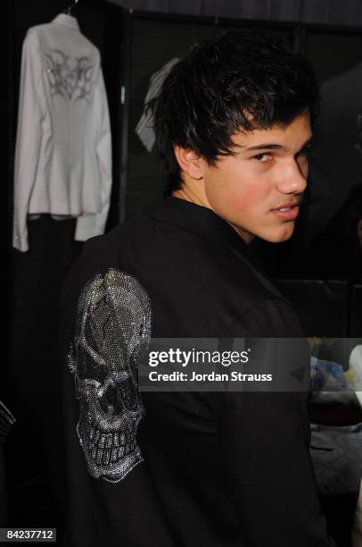 Actor Taylor Lautner attends the Access Hollywood "Stuff You Must..." Lounge produced by On 3 Productions celebrating the Golden Globes held at...