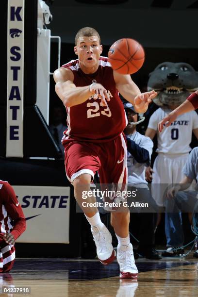Forward Blake Griffin of the Oklahoma Sooners passes the ball up court starting a fast brake against the Kansas State Wildcats during the first half...