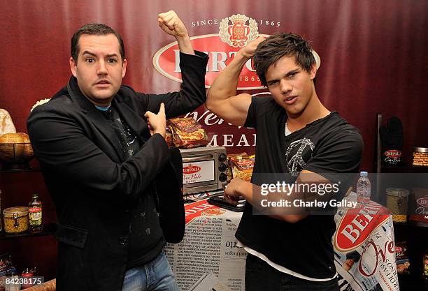 Ross "The Intern" Mathews and actor Taylor Lautner attends the Bertolli Oven Bake Meals at the Access Hollywood "Stuff You Must..." Lounge produced...