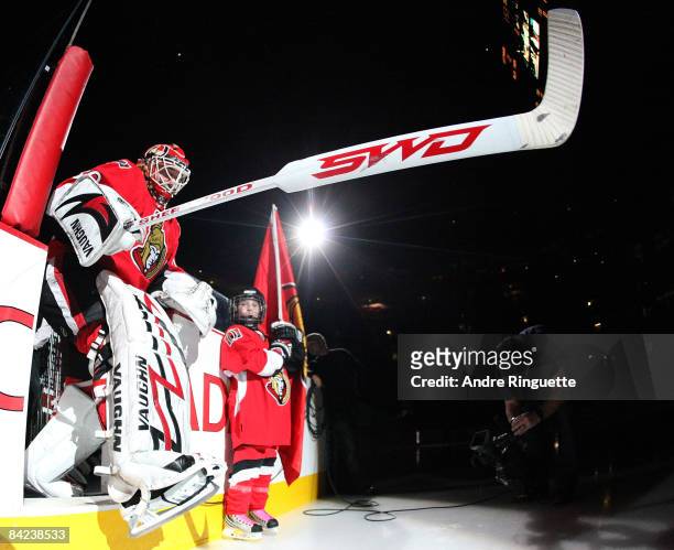 Brian Elliott of the Ottawa Senators steps on the ice during player introductions for his start against the New York Rangers after being called up...