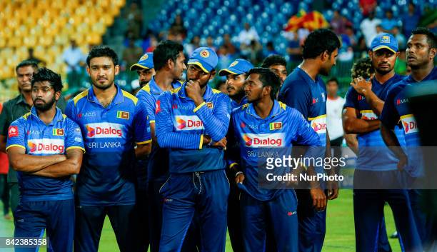 Sri Lankan cricket captain Upul Tharanga and the team mates are seen after the 5th and final One Day International cricket match between Sri Lanka...