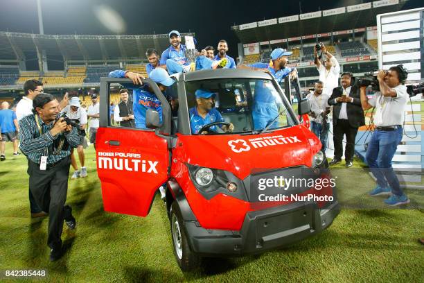 The Indian cricket team take a ride in a van after winning the ODI series against the host Sri Lanka by 5-0 after the 5th and final One Day...