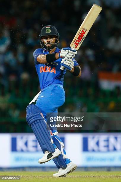 Indian cricket captain Virat Kohli plays a shot during the 5th and final One Day International cricket match between Sri Lanka and India at the R...