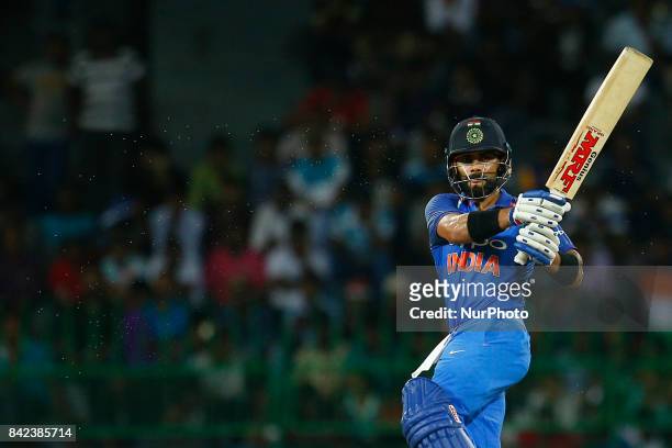 Indian cricket captain Virat Kohli plays a shot during the 5th and final One Day International cricket match between Sri Lanka and India at the R...