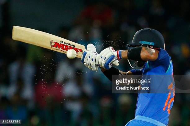 Indian cricket captain Virat Kohli plays a shot during the 5th and final One Day International cricket match between Sri Lanka and India at the R...