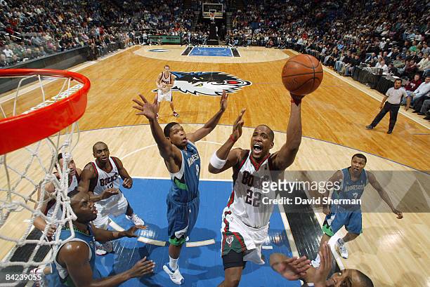 Michael Redd of the Milwaukee Bucks attacks the basket against Ryan Gomes of the Minnesota Timberwolves during the game on January 10, 2009 at the...