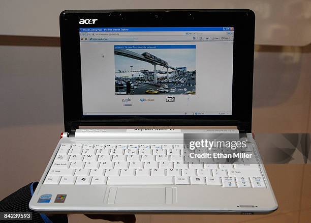 An Acer Aspire One netbook with an Intel Atom processor is displayed at the Intel Corp. Booth at the 2009 International Consumer Electronics Show at...