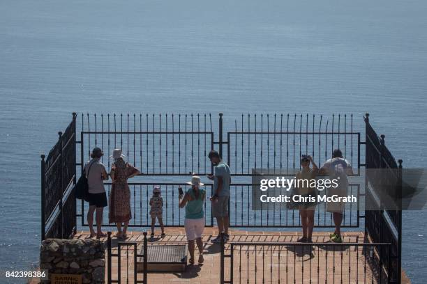 Tourists look out from the Alanya Castle on September 3, 2017 in Alanya, Turkey. Turkey's tourism industry spiraled into crisis in 2016 after a year...