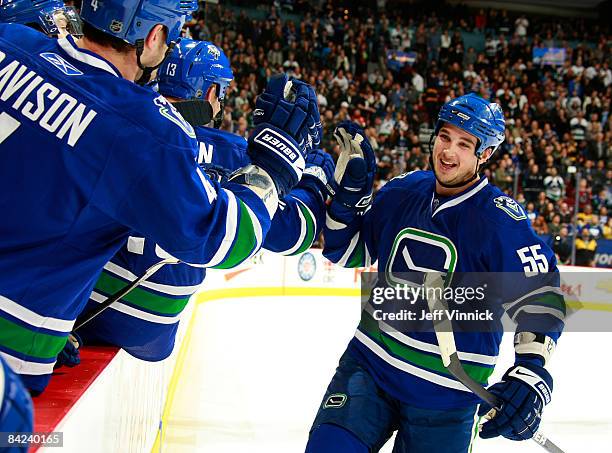 Shane O'Brien of the Vancouver Canucks celebrates a goal during their game against the San Jose Sharks at General Motors Place on January 10, 2009 in...