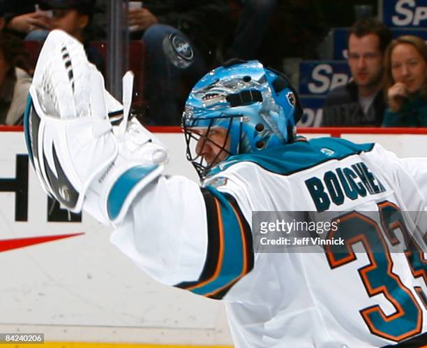 Brian Boucher of the San Jose Sharks deflects a puck high making a save on the Canucks during their game at General Motors Place on January 10, 2009...