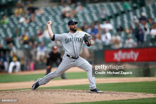 Tony Zych of the Seattle Mariners pitches during the game against the Oakland Athletics at the Oakland Alameda Coliseum on August 9, 2017 in Oakland,...