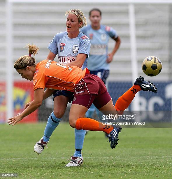 Brooke Spence of the Roar collides with Joanne Burgess of Sydney FC during the W-League Semi Final match between the Queensland Roar and Sydney FC at...