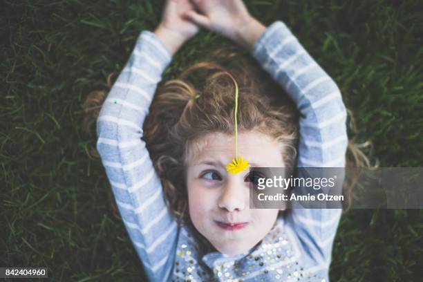 Girl with Dandelion on Her Head