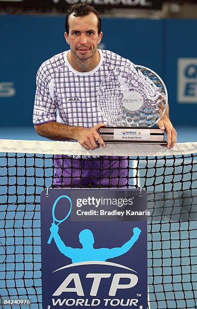 Radek Stepanek of the Czech Republic poses with the winners trophy after defeating Fernando Verdasco of Spain in the Mens final during day eight of...