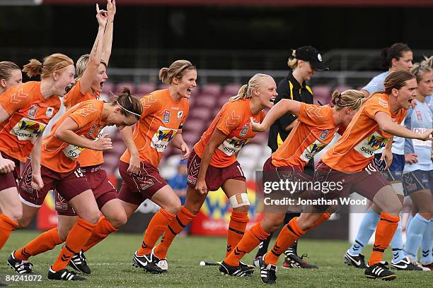 The Qld Roar Women celebrate victory after a penalty shootout during the W-League Semi Final match between the Queensland Roar and Sydney FC at...