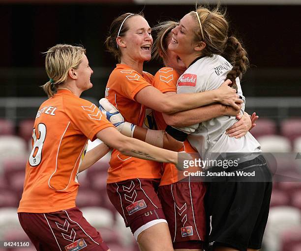 Casey Dumont of the Roar celebrates after saving a penalty in a penalty shootout during the W-League Semi Final match between the Queensland Roar and...