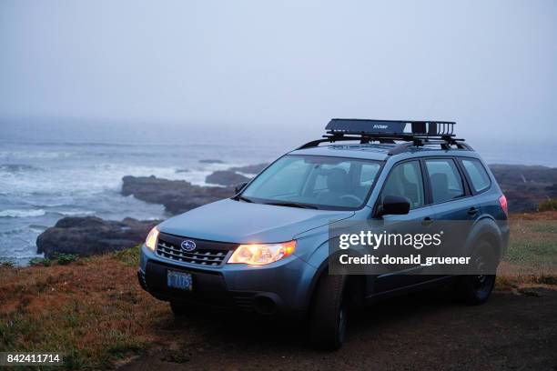 2012 subaru forester along oregon coast - forestry worker stock pictures, royalty-free photos & images