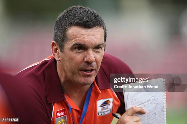 Roar coach Jeff Hopkins speaks during half time of the W-League Semi Final match between the Queensland Roar and Sydney FC at Ballymore on January...