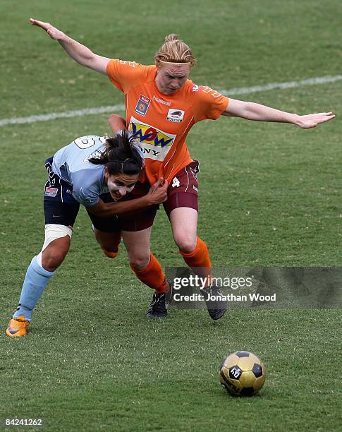 Clare Polkinghorne of the Roar and Leena Khamis of Sydney FC contest for the ball during the W-League Semi Final match between the Queensland Roar...