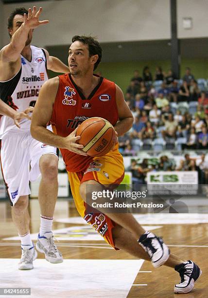 Luke Kendall of the Tigers drives to the basket during the round 17 NBL match between the Melbourne Tigers and the Perth Wildcats at the State...