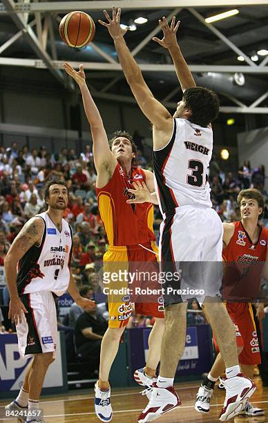 Daryl Corletto of the Tigers shoots at the basket during the round 17 NBL match between the Melbourne Tigers and the Perth Wildcats at the State...