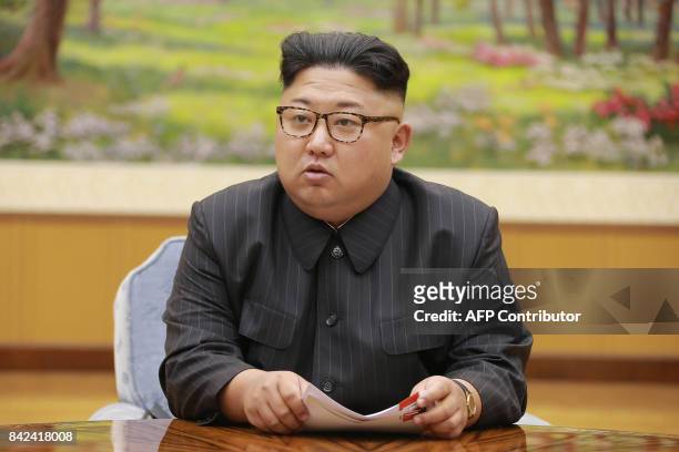 This picture taken on September 3, 2017 and released by North Korea's official Korean Central News Agency on September 4, 2017 shows North Korean...