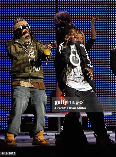 Rap artists T-Pain and Flavor Flav perform during the 26th annual Adult Video News Awards Show at the Mandalay Bay Events Center January 10, 2009 in...