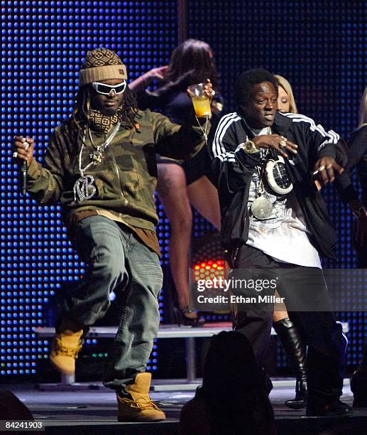 Rap artists T-Pain and Flavor Flav perform during the 26th annual Adult Video News Awards Show at the Mandalay Bay Events Center January 10, 2009 in...