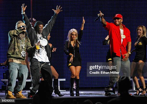 Rap artists T-Pain, Flavor Flav and Flo Rida perform during the 26th annual Adult Video News Awards Show at the Mandalay Bay Events Center January...