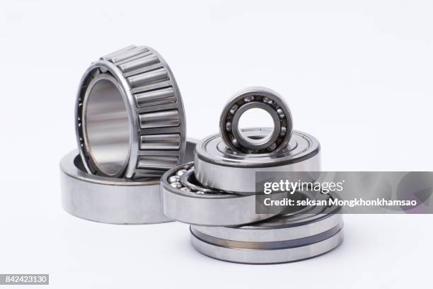 gears and bearings on the white background. - part stockfoto's en -beelden