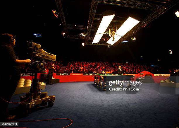 Graeme Dott breaks at the start of the second frame against Stephen Maguire during the Masters Snooker at Wembley Conference Centre on January 11,...