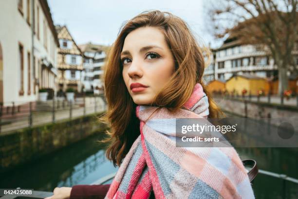 young woman enjoying in strasbourg, france - strasbourg winter stock pictures, royalty-free photos & images