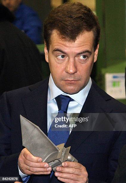 Russian President Dmitry Medvedev visits the mechanical treatment shop of the Moscow Machine-Building Plant Salyut on January 11, 2009. President...