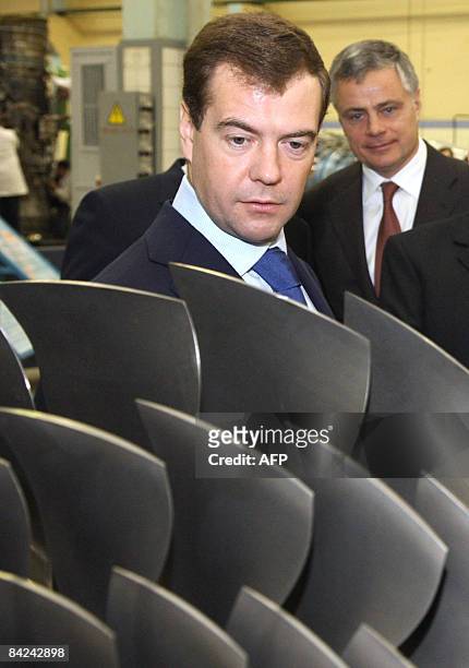 Russian President Dmitry Medvedev visits the mechanical treatment shop of the Moscow Machine-Building Plant Salyut on January 11, 2009. President...